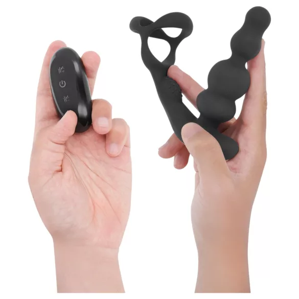 Addicted Toys - roterende analvibrator med penisring (svart)